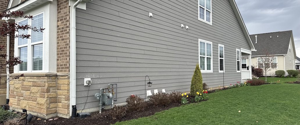 Fox Valley Plumbing licensed technician reviewing plumbing estimate with Elgin homeowner