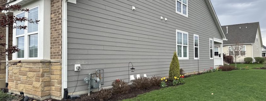 Fox Valley Plumbing licensed technician reviewing plumbing estimate with Elgin homeowner