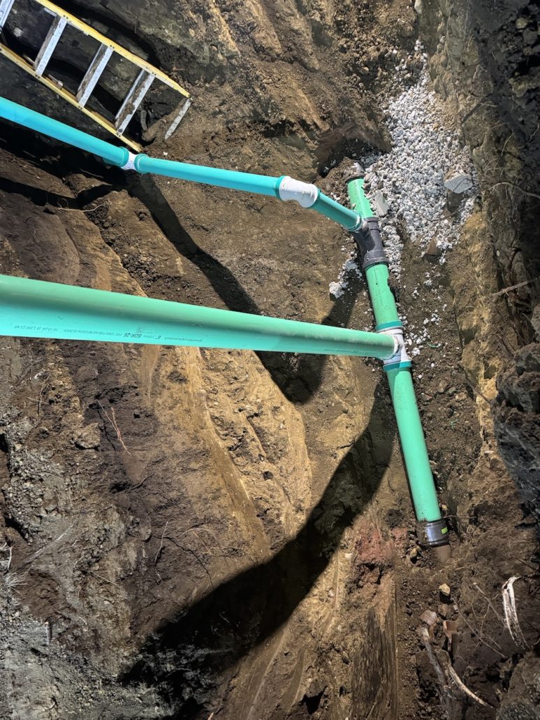 Tree root intrusion inside a cracked sewer line in Kane County 