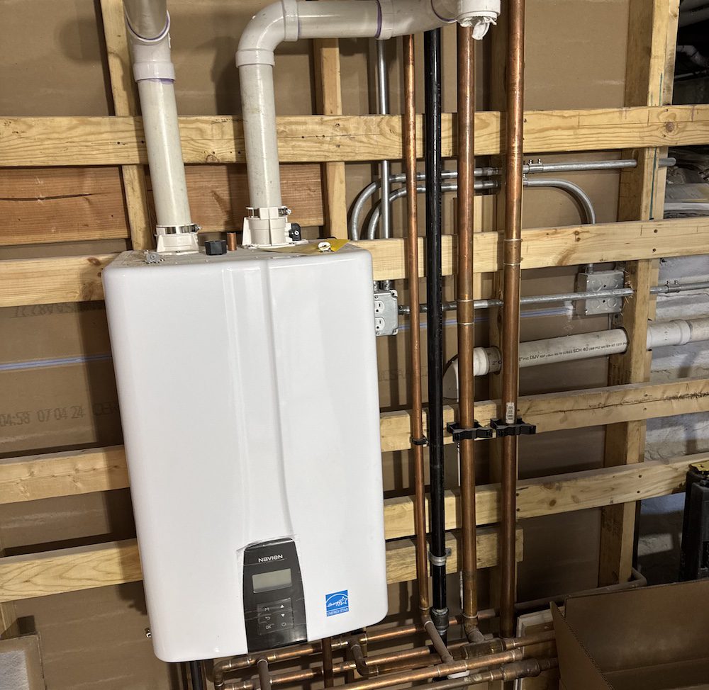Tankless water heater installation in Elgin IL home by licensed plumber