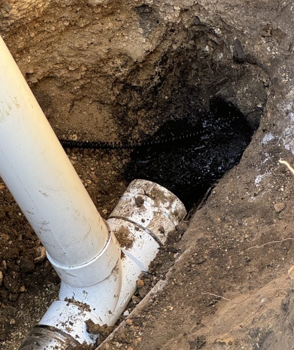 sewer-line-repair-elgin-storm-backup Flooded basement drain after summer storm in Elgin IL sewer line backup