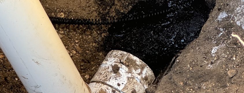 Flooded basement drain after summer storm in Elgin IL sewer line backup