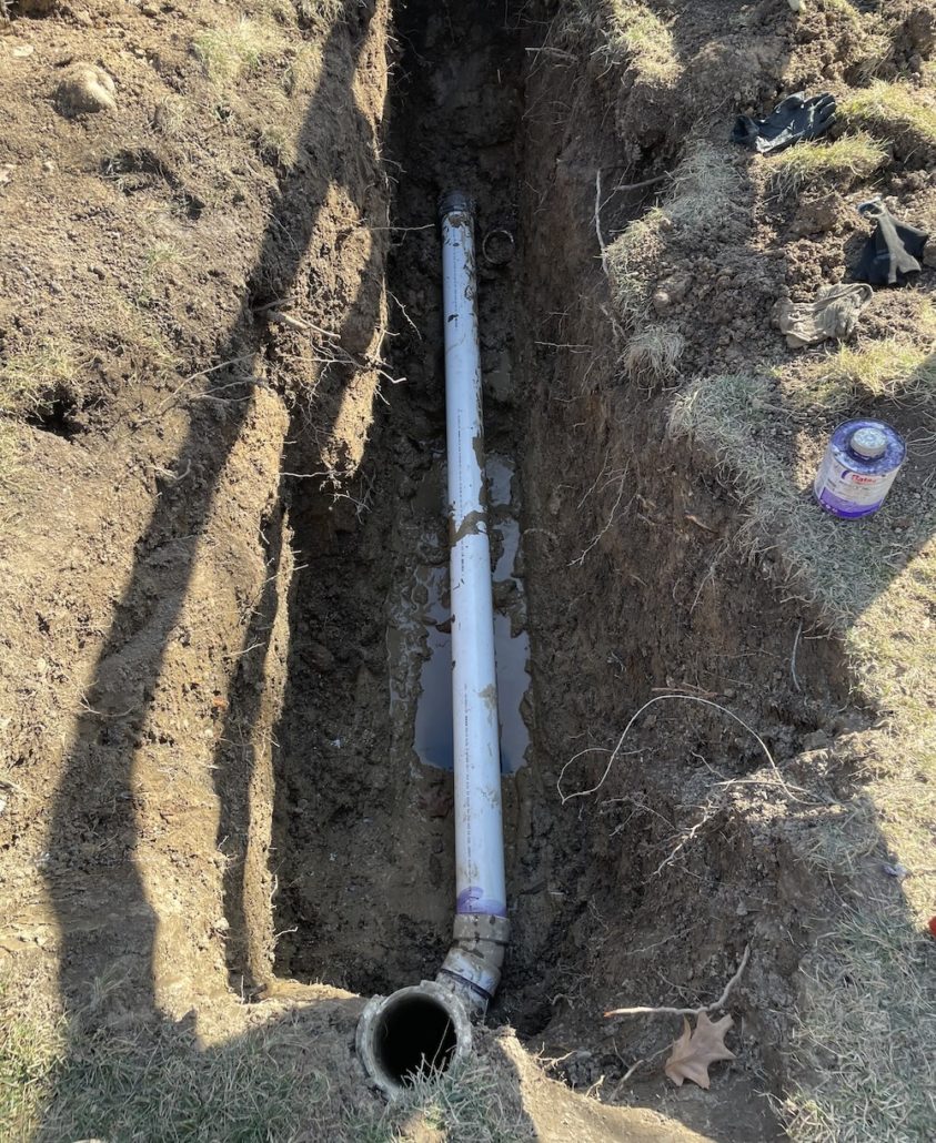 Licensed plumber performing video sewer inspection in Elgin Illinois home